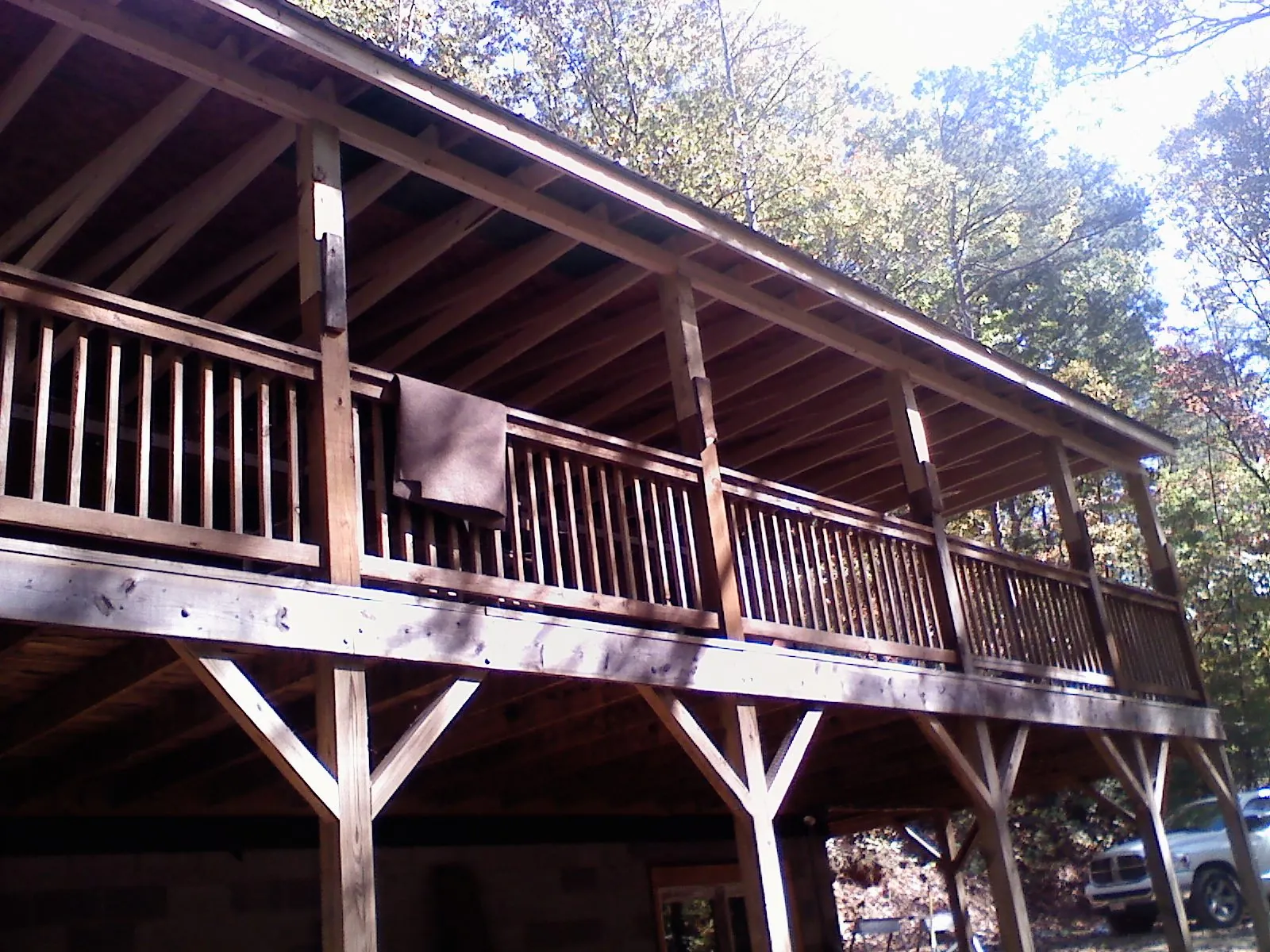 Timber framing under a new elevated porch and deck — Roof Leak Repair in Heppner by Roofing Brothers